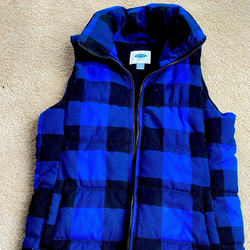 Blue and black winter vest.